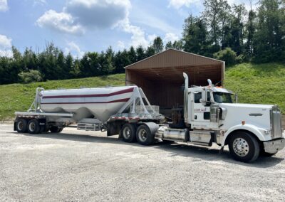 CSR Services Large Kenworth Tanker Truck Hauling Material from one site to another